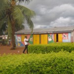 Small rural school building with yellow doors